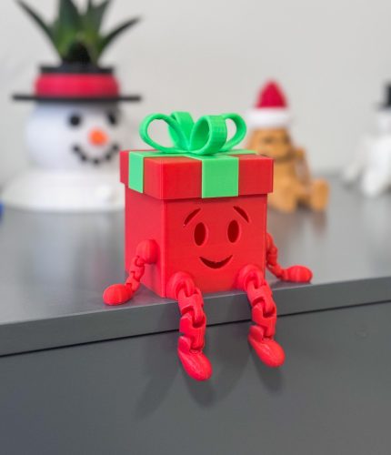 3D Mosolygós Ajándékdoboz – Ülő Dekor Figura