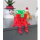 3D Mosolygós Ajándékdoboz – Ülő Dekor Figura